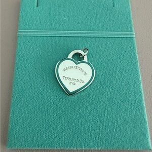Tiffany & Co heart charm with blue enamel